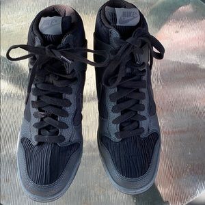 Nike Black wedge sneakers.
